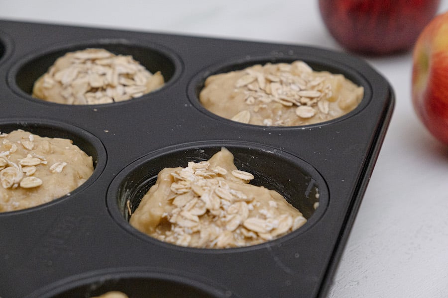 muffin batter in a tin