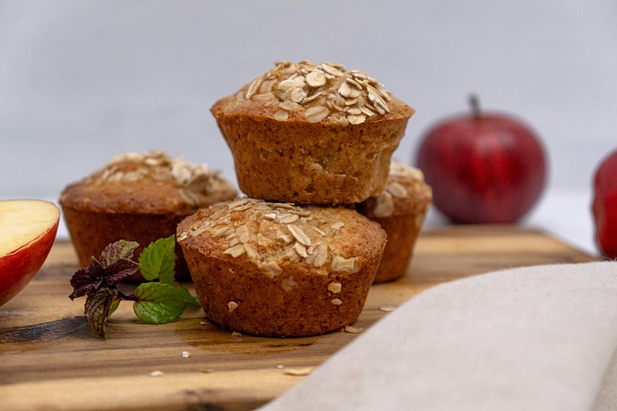 muffins stacked on cutting board
