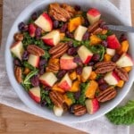 kale and sweet potato salad in white bowl