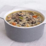 mushroom and wild rice soup in white bowl
