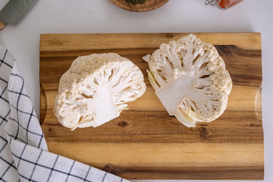 cauliflower prepped on cutting board
