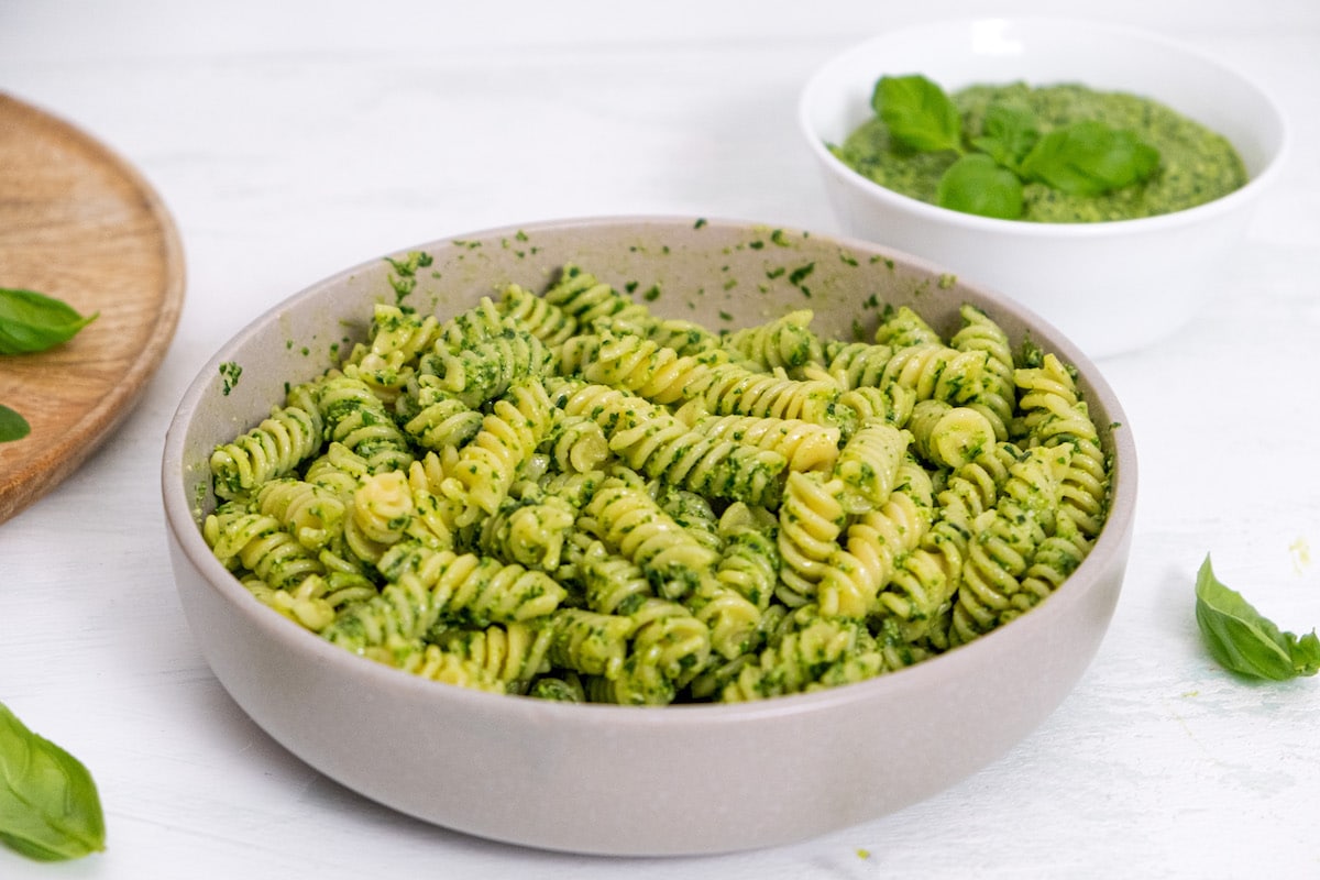pasta in a bowl with pesto