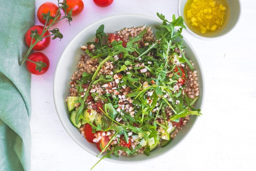 grain salad in white bowl