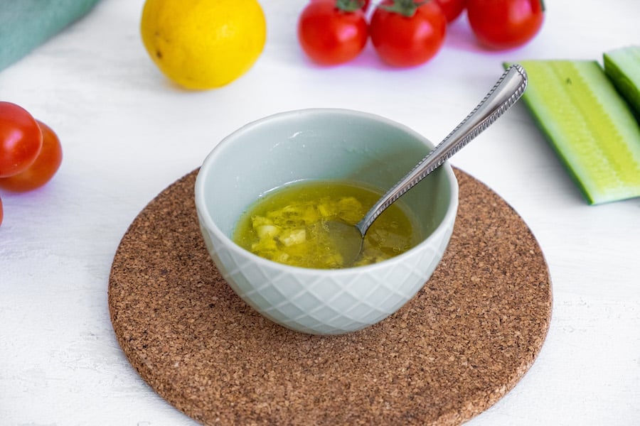 salad dressing in white bowl