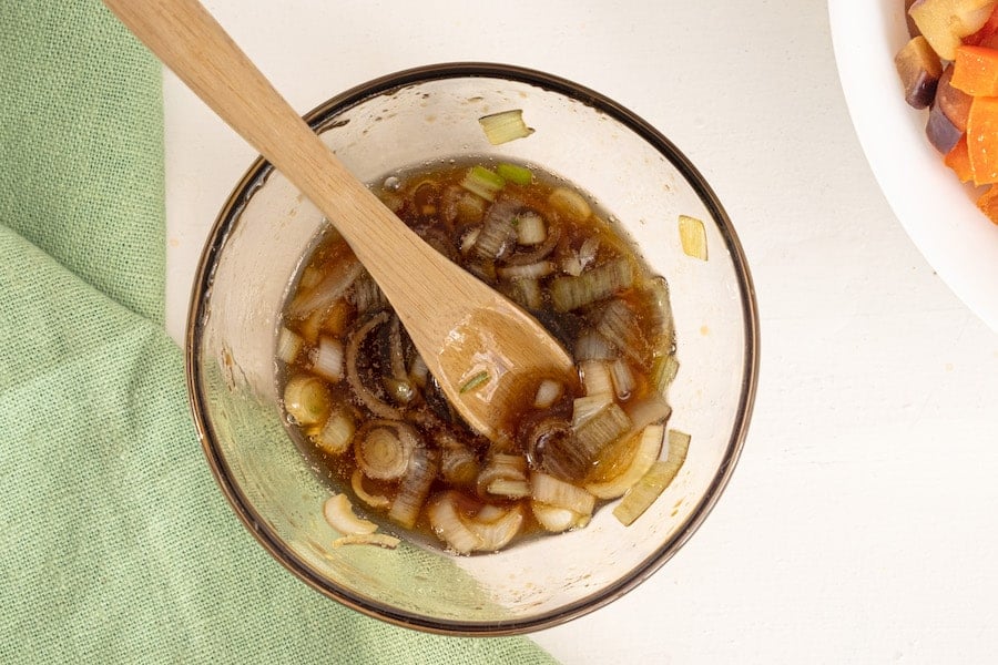 sauce prepared in a bowl with wooden spoon