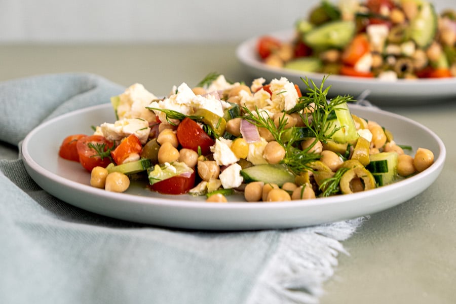chickpea and feta salad on white plate