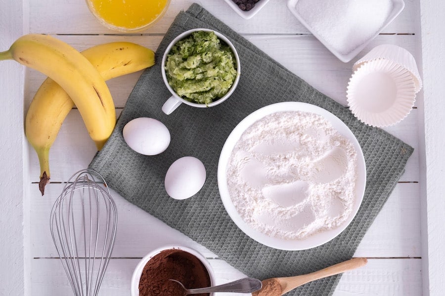 zucchini muffin ingredients on counter