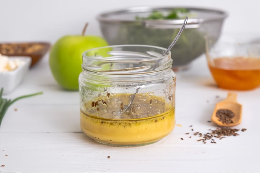 apple cider vinegar salad dressing in glass jar